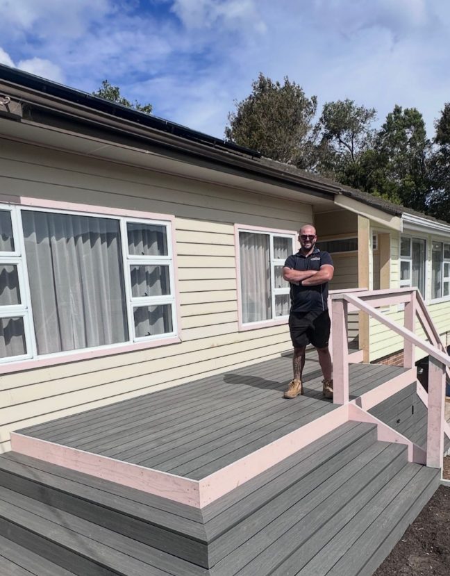 Max from Clearview Carpentry standing on new deck build on an Illawarra Home